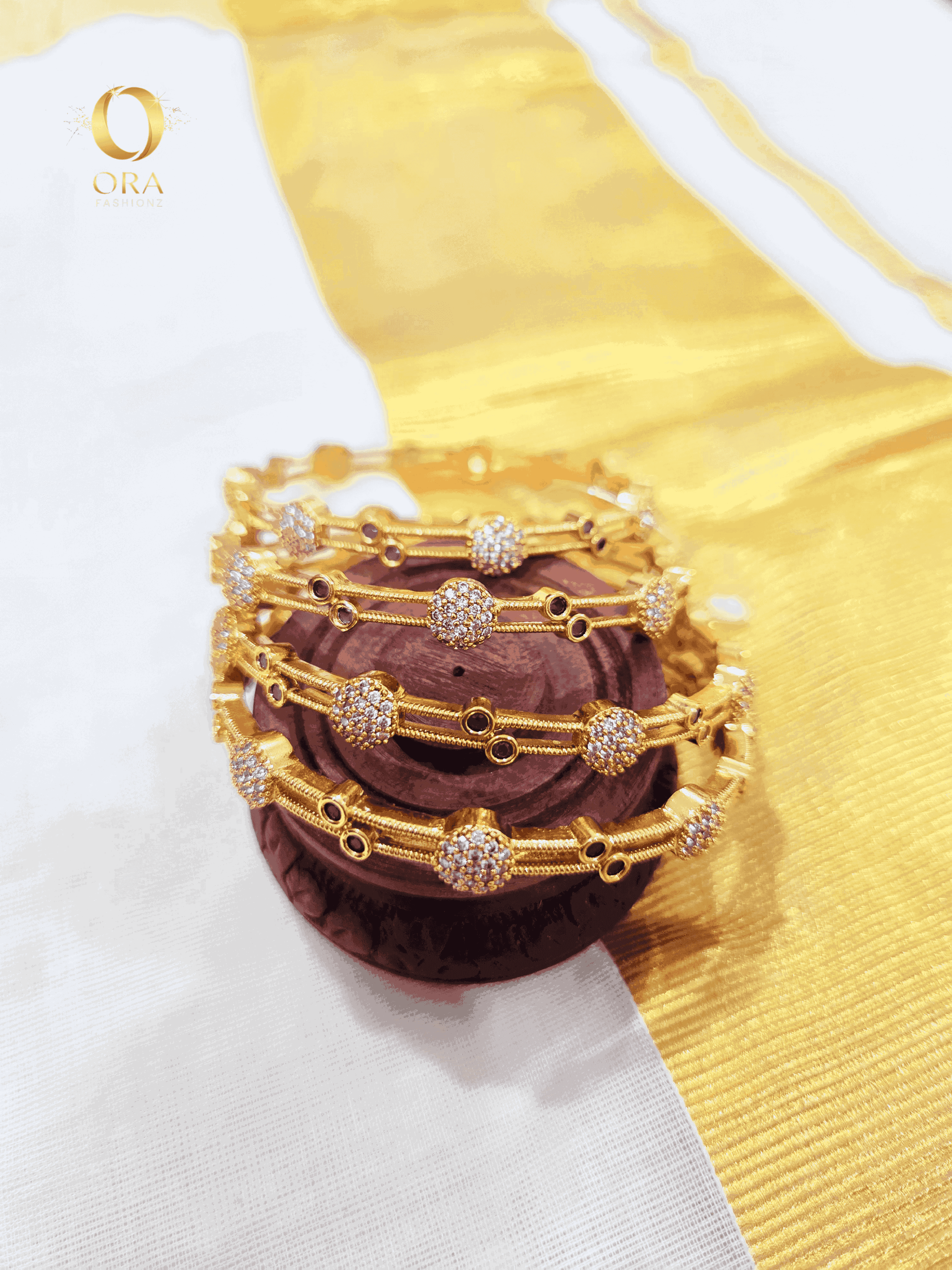 ORA ANTIQUE BANGLES WITH AD STONES AND EMERALD